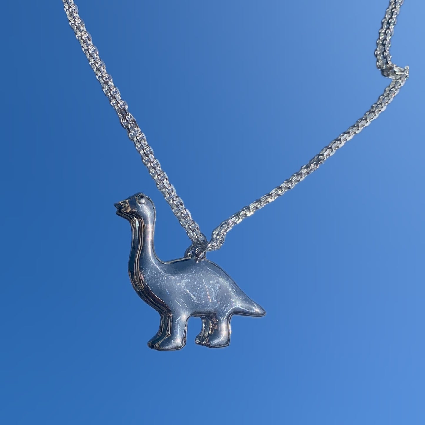Super cute brontosaurus necklace