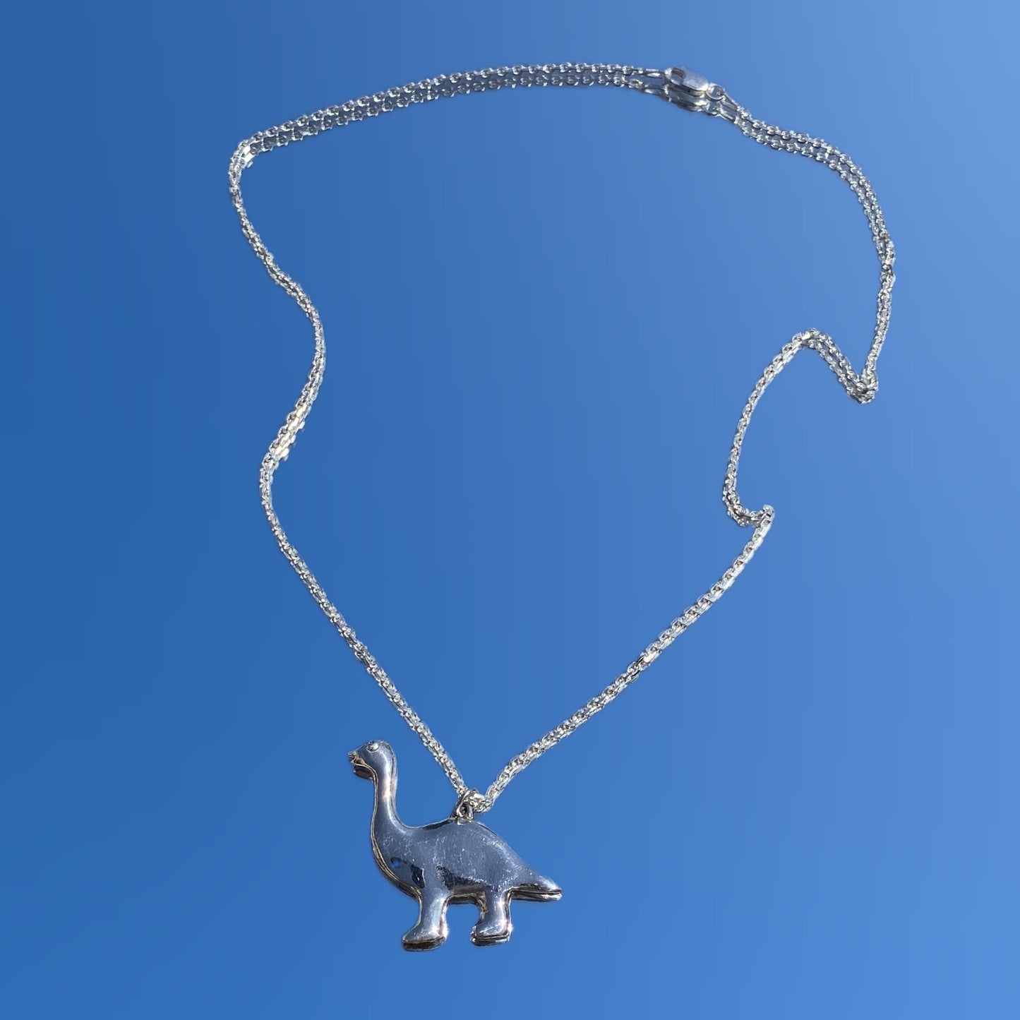 Super cute brontosaurus necklace
