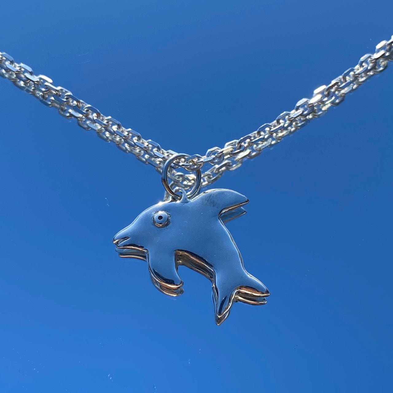 Cute little dolphin by Elia necklace